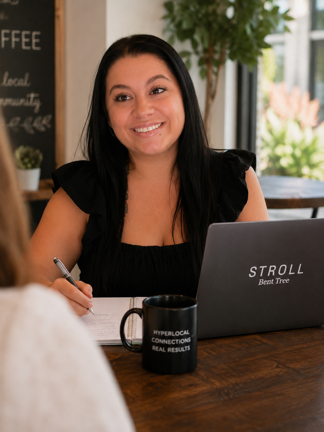 Jessica Harris meeting with a local business owner for Stroll Bent Tree.